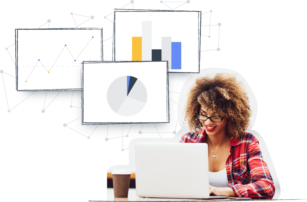 A woman at a laptop in front of campaign charts and graphs